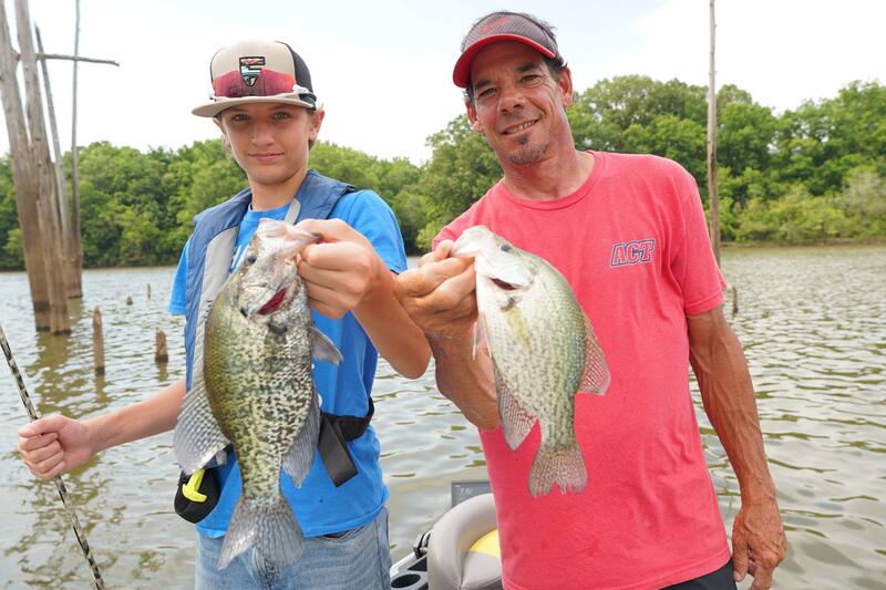 Name:  crappie pro Kevin Mccarley and young angler holding some crappie they caught together live sonar.jpg
Views: 199
Size:  77.1 KB