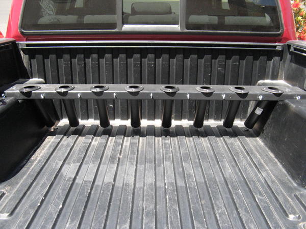 Truck bed rod holder